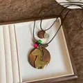 Vintage horse pendant necklace with wooden and brass details, stylish adjustable cord - Retro Bohemian Wooden Horse Sweater Necklace (44#)