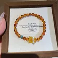 Elegant amber agate beaded bracelet featuring a yellow cat paw charm and pearls - Little Bear Amber Beeswax Style(52) / Suspension Box Packaging