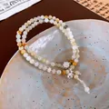 Handcrafted New Chinese style double-strand beaded bracelet with silver flower charm - 64# White Multi-loop Bell Pendant Style