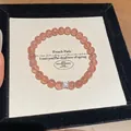 Elegant red natural stone bead bracelet featuring a sparkling silver butterfly charm detail - Strawberry Quartz Style(64) / 6mm / Suspension Box