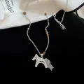 Silver zircon horse pendant necklace with brown beads and tassel, luxury style jewelry. - Silver Zirconia Galloping Horse Tassel Beaded Necklace (16#)