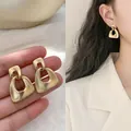 Eleganti orecchini geometrici in oro opaco dal design francese minimalista ed unico - 几何镂空哑光款式(21#)