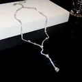 Elegant Y-shaped lariat necklace with sparkling drop-cut cubic zirconia and tassel detail. - Silver