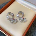 Detailed view of silver rocking horse earrings with pearls and crystal pavé - Rocking Horse Shape / Silver