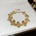 Elegant gold-tone flower petal bracelet with adjustable chain and lobster clasp closure - Hydrangea Irregular Bracelet (20#)