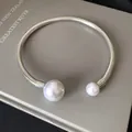 Minimalist silver-tone spring metal choker necklace with elegant dual faux pearls - Spiral Beaded Open Choker (25#)