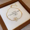 Elegante bracciale regolabile oro con fiore di zirconi scintillanti al centro - Braccialetto a fiore traforato in zirconia trasparente (74#) / Oro