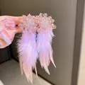 Handcrafted bohemian pink feather drop earrings with elegant sparkling crystal accents - Pink Beaded Feather Style (HE11035)
