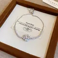 Elegante bracciale a quadrifoglio d'argento con brillanti cristalli di zirconia - Braccialetto Tennis in Zirconia con Quadrifoglio (81#) / Argento