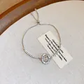 Bracciale regolabile in zircone argento con medaglione Madonna su sfondo beige - 79# Braccialetto in Zirconia con Medaglia Religiosa (WB941) / Argento