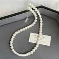Elegant pearl beaded necklace with silver-tone curved bar pendant French retro style - White Matte Geometric Style (75#) / White