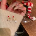 Close-up of Christmas tree drop earrings with sparkling crystals on knit fabric. - Red Christmas Tree Style (4#)