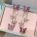 Elegant purple glitter butterfly tassel earrings with sparkling rhinestone accents - Hollow Butterfly Style (23#)