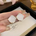 Elegant silver stud earrings featuring a square white cabochon stone for a minimalist look. - White Square Style (50#)