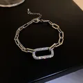 Elegant silver geometric link bracelet with sparkling rhinestone pavé rectangle charm. - Silver