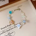 Handmade colorful beaded bracelet featuring heart, smiley face, and dice charms. - Handmade Beaded Pendant Style (36#) / Colorful