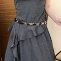 Black leather belt with vintage silver sun-shaped metal ornaments on a gray dress. - 56# Silver Black