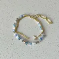 Multi-layer beaded bracelet with blue and white glass stones and gold-tone chain detail - Cut Glass Stacking Style (39#) / Gold / Blue / Gray