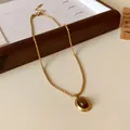 Retro Maillard style tiger eye stone pendant necklace with gold twist chain jewelry - Rope Chain Oval Pendant / Gold (1)