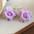 Elegant lavender fabric rose stud earrings featuring realistic dew drops and green leaves - Light Purple