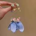 Detailed close-up of long floral tassel earrings with light blue chiffon petals. - Romantic Holiday Forest Style (57#)