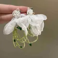 Detail of handmade chiffon flower earrings with light green bead tassels and rose accents - Chiffon Petal with Acrylic Rose (6#)
