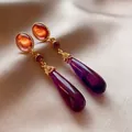 Vintage Maillard style gold drop earrings featuring amber oval and purple teardrop stones. - Color Block Teardrop (HE55)