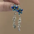 Elegant blue flower tassel earrings with long silver leaf charms in a vintage forest style - Blue Flower with Metal Leaf Tassel (43#)