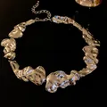 Collana girocollo metallica argento irregolare con un design unico a trama fusa lucida - Collana / Argento
