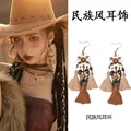 Detailed view of bohemian tassel earrings featuring ethnic leaf and bead accents - Ear Hook (6#) / Brown