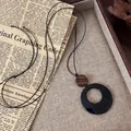 Detail of vintage ethnic necklace with black circular pendant and wooden bead. - Black Circle Pendant (7#)