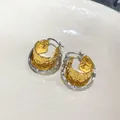 Detail view of gold and silver double-layered hoop earrings with crumpled metal texture - Double Layer Pleated / Two-tone Gold Silver