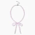 Elegante rosa Perlenkette mit zartem Schleifendesign für einen süßen Damen-Look. - Rosa Schleife