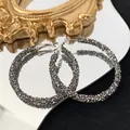 Exaggerated silver pin hoop earrings adorned with sparkling dark grey zircon stones - Zirconia Circle (16#) / Silver