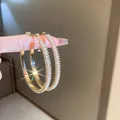 Elegant gold-plated large hoop earrings with sparkling baguette-cut cubic zirconia - Large Zirconia Pave Hoop Style (46#) / 7cm / White