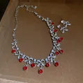 Vintage Palast Schmuckset mit roten Strasssteinen Schleifen Halskette und Ohrringen - Silber-Rot