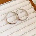 Elegant silver-toned textured hoop earrings for a minimalist and sophisticated look - Hammered Round Hoop Style (127#) / Silver