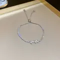 Detail view of butterfly zircon bracelet with adjustable sliding clasp mechanism - Butterfly Style Bracelet (HB1174) / Silver