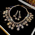 Conjunto de collar y pendientes de circón chapado en oro de 18K con destellos - Combinación De Collar Y Pendientes De Flores
