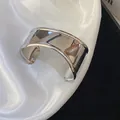 Close-up of a stylish silver irregular geometric cuff bracelet with a polished finish - Geometric Style (4#) / Silver
