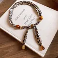 Vintage leopard print silk scarf necklace with resin beads for stylish women - Leopard Print