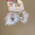 Close-up of fluffy white pom-pom earrings with cute bear and crystal heart charms - 12# Silver Post Style / White/Bear