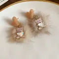 Close-up detail of teddy bear earrings with soft fur balls and heart-shaped crystals. - Style 14 Silver Post / Coffee/Pink
