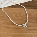 Minimalistische parelketting met een schattige lichtblauwe hobbelpaard-hanger - Parel Blauw Paard Stijl (31#)