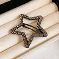 Sparkling star-shaped hair clip with champagne rhinestones on a dark metal base for women. - 33# BB Clip - Vintage Rhinestone Star