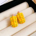 Cute corn-shaped yellow resin hair clip with green accents presented in a jewelry display box - 60# Duckbill Clip - Creative Corn