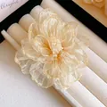 Elegant champagne organza layered flower hair clip shown on a white jewelry tray - 79# Duckbill Clip - Gauze Flower