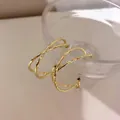 Elegant textured gold cross-layered hoop earrings featuring a modern minimalist design - Hammered Crisscross Style (18#) / Gold