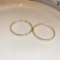 Elegant large golden metal hoop earrings with a smooth polished finish for women - Shiny Simple Style (24#) / Gold