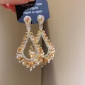 Eleganti orecchini pendenti con zirconi color champagne e ago in argento S925 di lusso. - Stile nappine goccia d'acqua champagne (68#) / Oro